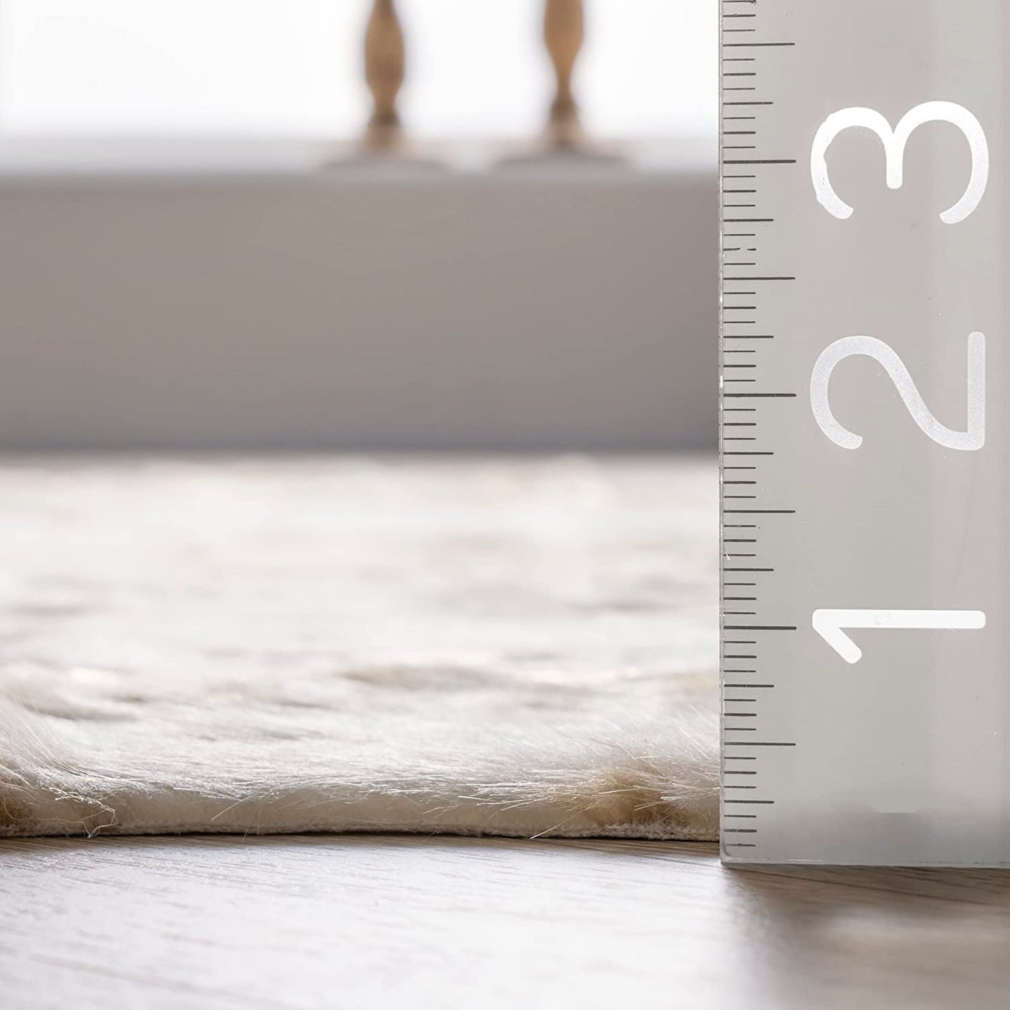 Iraida Contemporary Faux Cowhide Area Rug