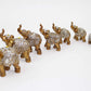 Set of 7 Lovely Lucky Elephants Statues Feng Shui Figurine Home Decor Housewarming Birthday Display Stands (Brass)
