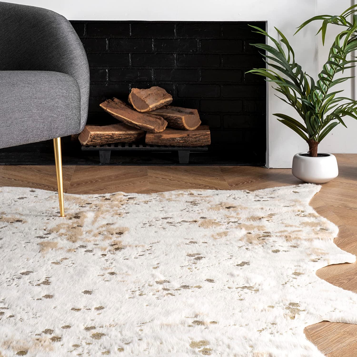 Iraida Contemporary Faux Cowhide Area Rug