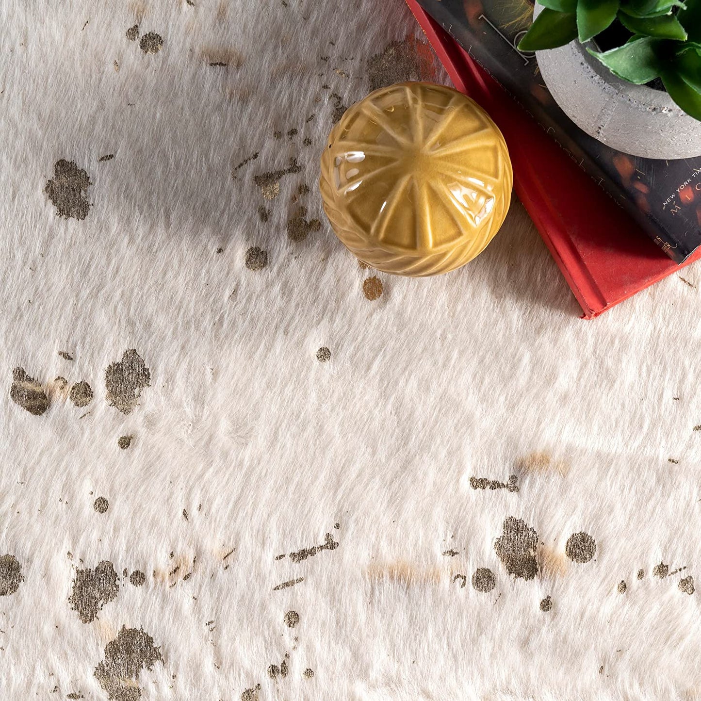 Iraida Contemporary Faux Cowhide Area Rug