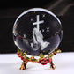 60MM Crystal Ball Engraved 3D Hand Holding a Cross Figurine with Rose Stand Praying Religious Gifts for Women, Christian Gifts for Friend Glass Paperweight Home Decorations (2.36 In.)