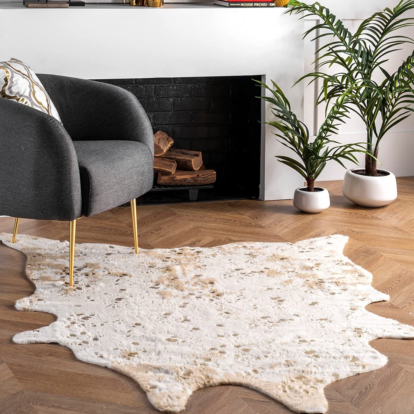 Iraida Contemporary Faux Cowhide Area Rug