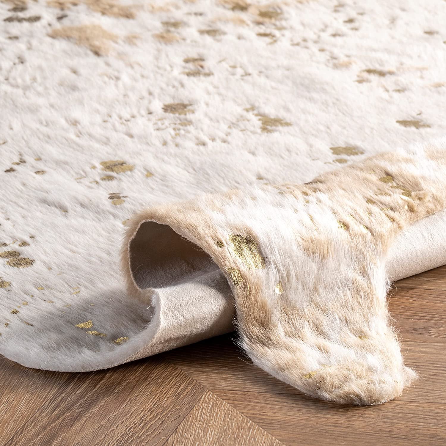 Iraida Contemporary Faux Cowhide Area Rug