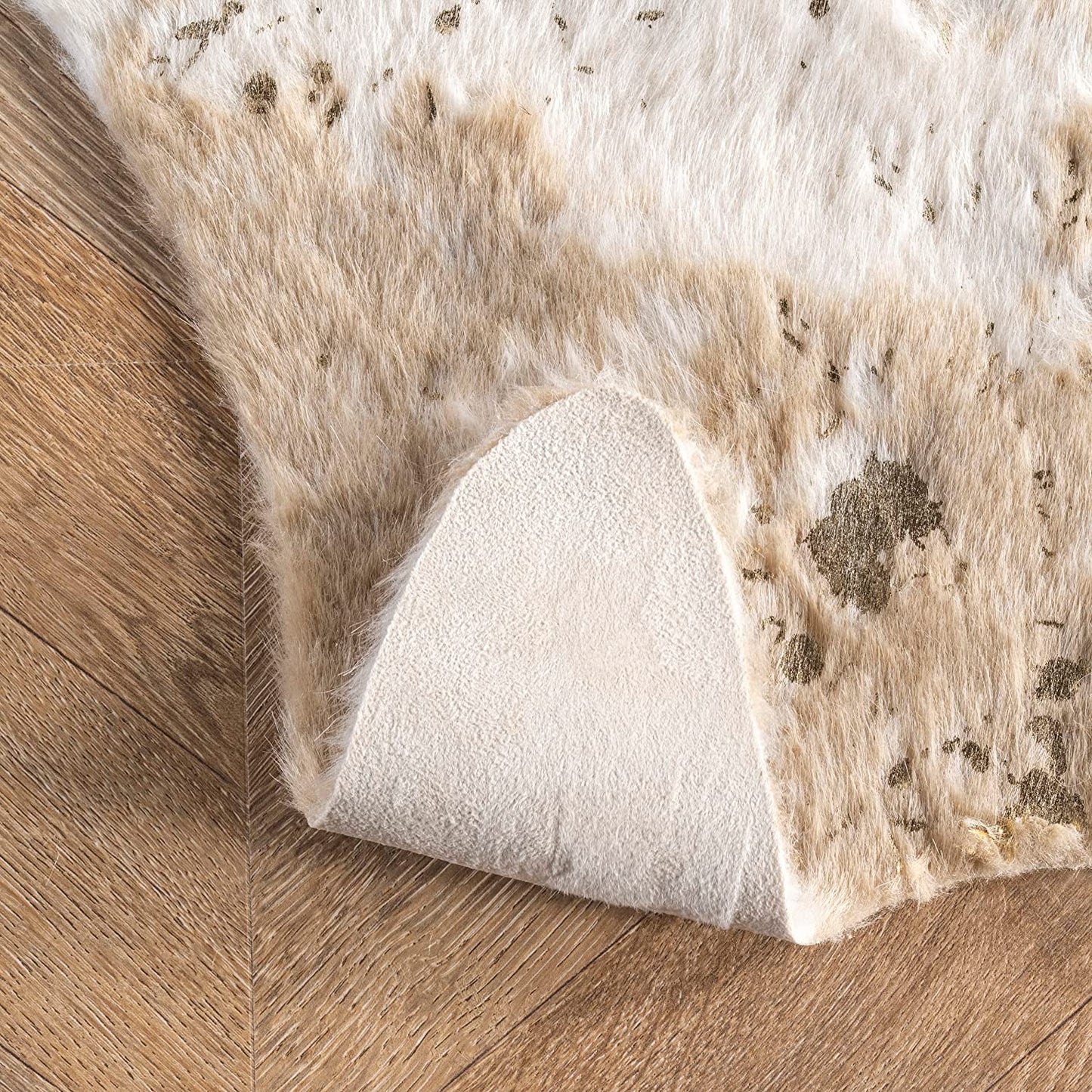 Iraida Contemporary Faux Cowhide Area Rug