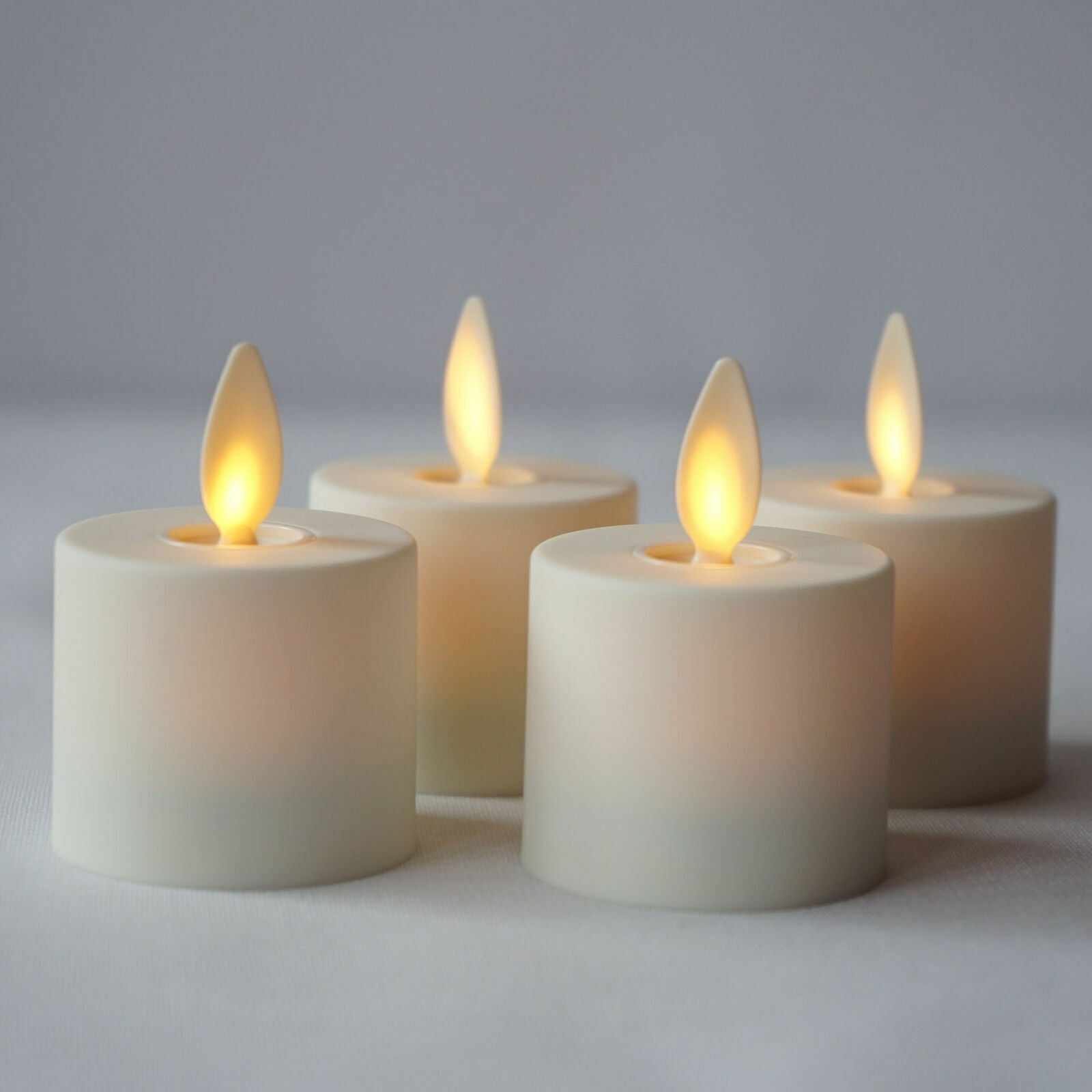 Luminara Flameless Tealight Candles Moving Wick Ivory with Remote Timer Set of 4