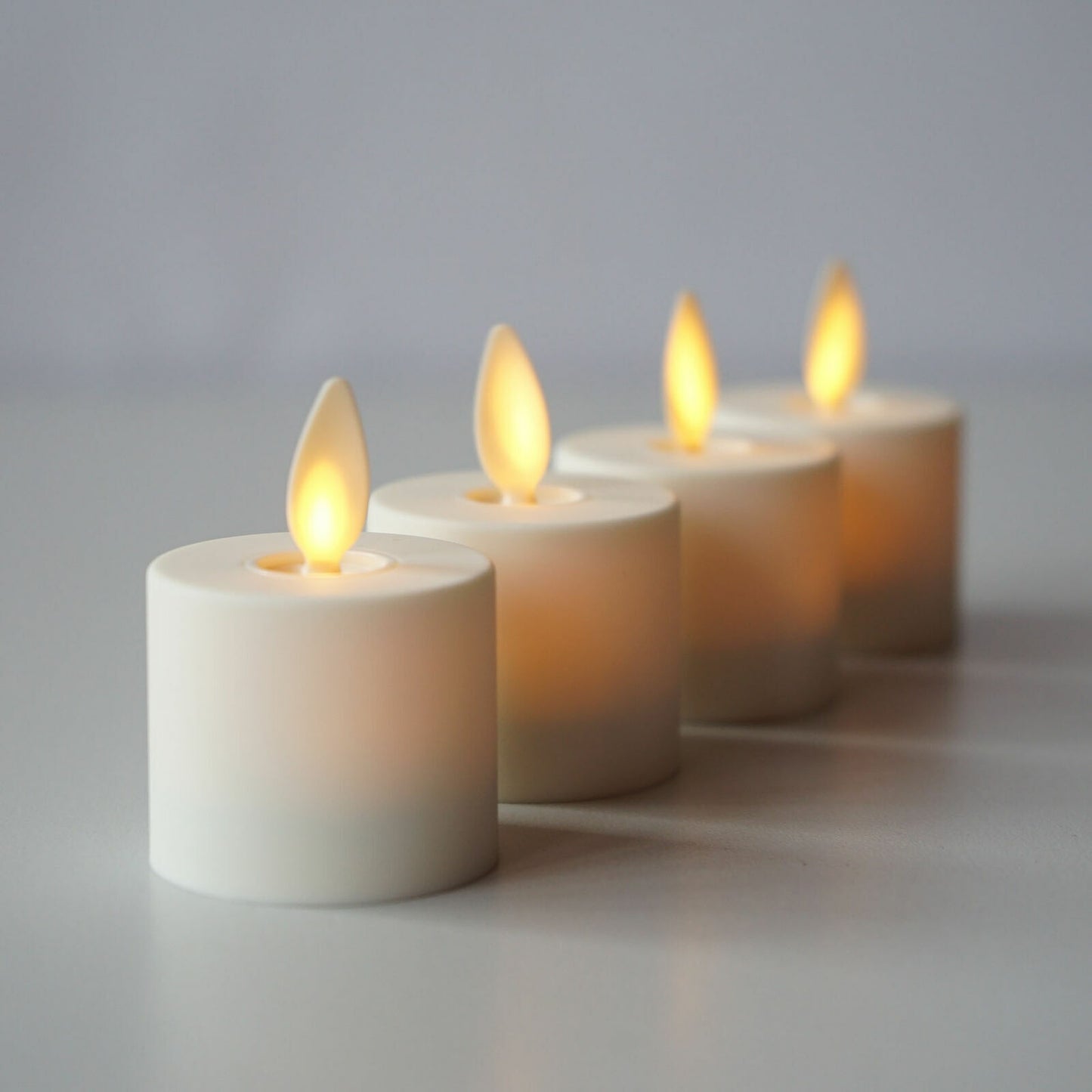 Luminara Flameless Tealight Candles Moving Wick Ivory with Remote Timer Set of 4