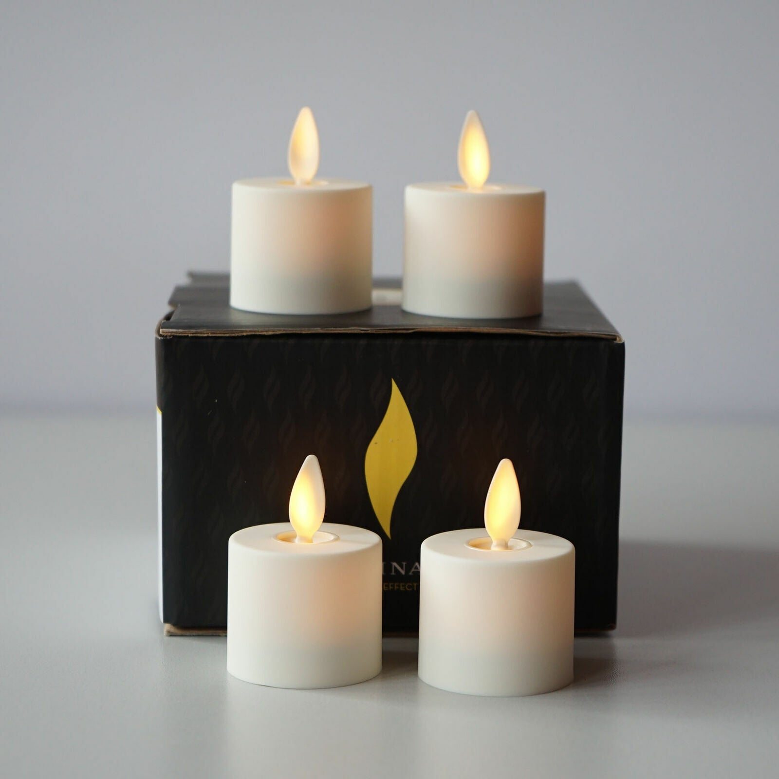 Luminara Flameless Tealight Candles Moving Wick Ivory with Remote Timer Set of 4